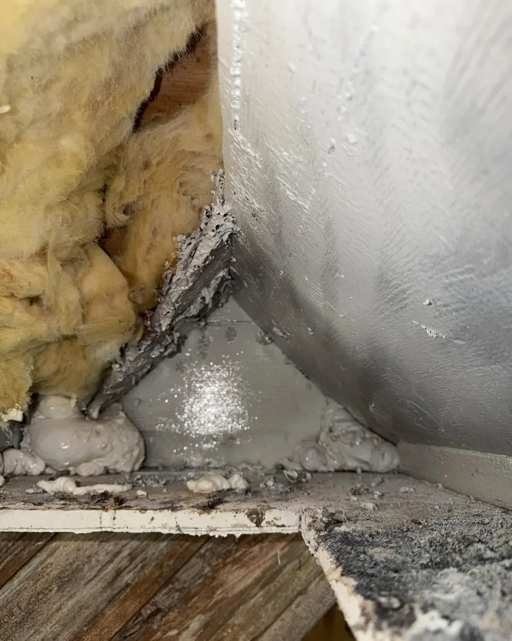 Soffit gap sealed with foam after a removal